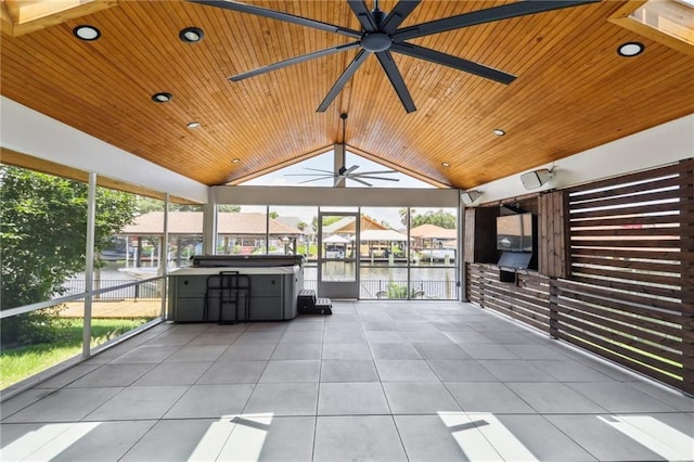 unfurnished sunroom featuring wood ceiling and vaulted ceiling