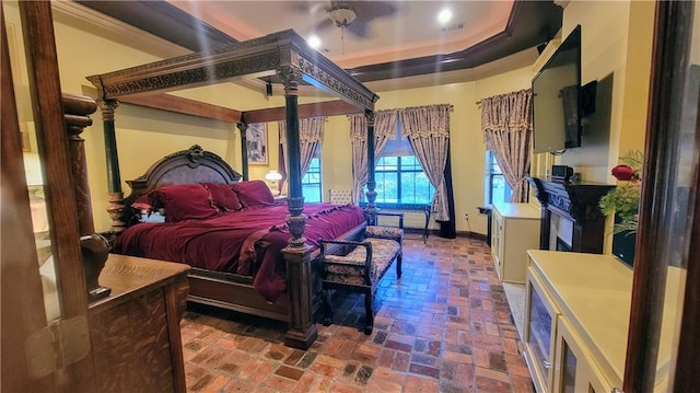 bedroom with a tray ceiling