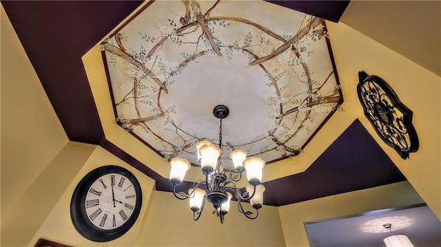 interior details featuring a notable chandelier