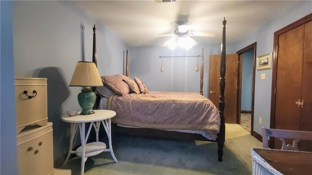 carpeted bedroom with ceiling fan