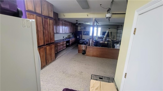 kitchen with white fridge and ceiling fan