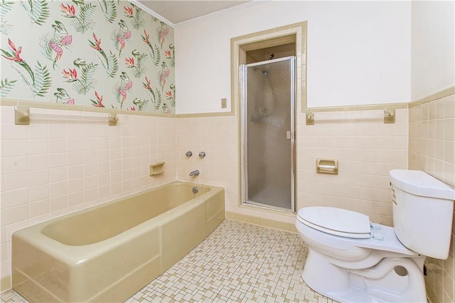 bathroom featuring tile walls, toilet, shower with separate bathtub, and tile flooring