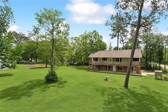 view of yard featuring a deck