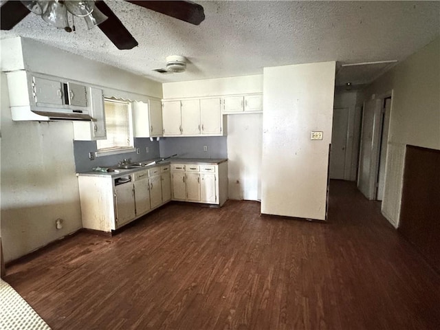 kitchen featuring white cabinets, a textured ceiling, ceiling fan, and dark hardwood / wood-style flooring