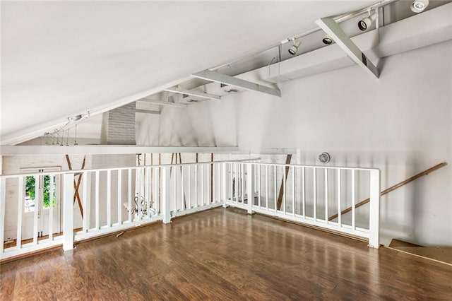 additional living space featuring dark hardwood / wood-style flooring