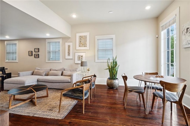 living room with dark hardwood / wood-style floors