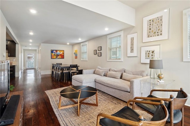 living room featuring dark hardwood / wood-style floors