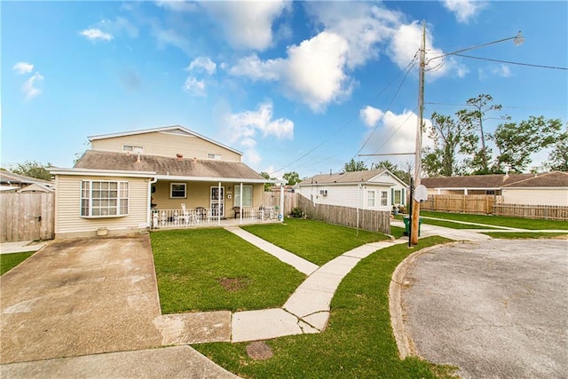 view of front of house featuring a porch and a front lawn