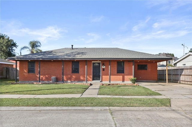 ranch-style home with a front yard