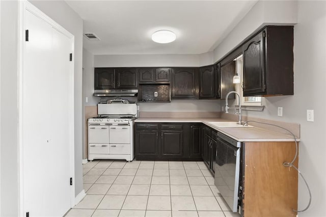 kitchen featuring white range, dark brown cabinets, dishwashing machine, sink, and light tile patterned floors