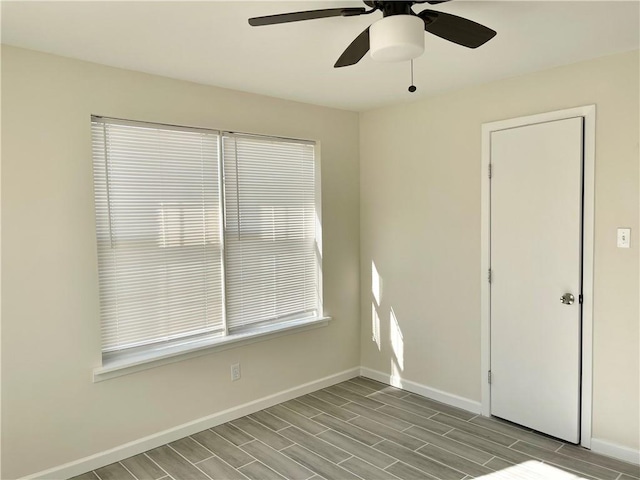 unfurnished room featuring wood-type flooring and ceiling fan