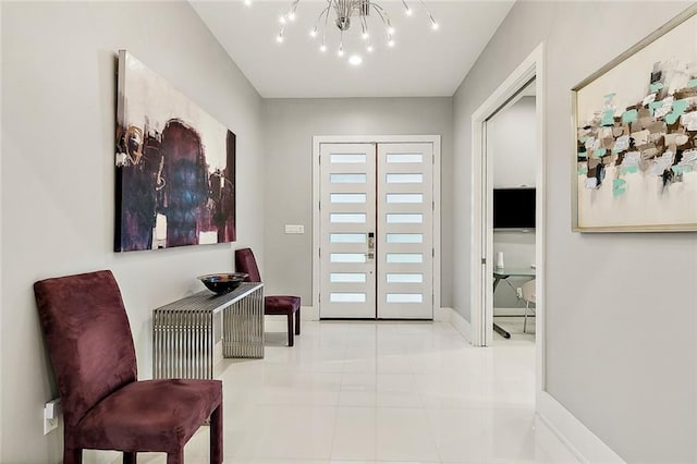 living area with french doors, an inviting chandelier, and tile floors