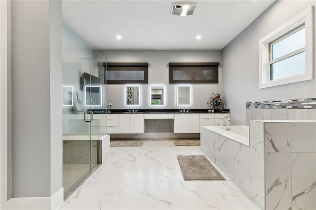 bathroom with double sink vanity, plus walk in shower, and tile flooring