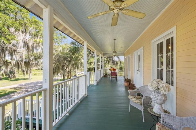 wooden terrace with ceiling fan