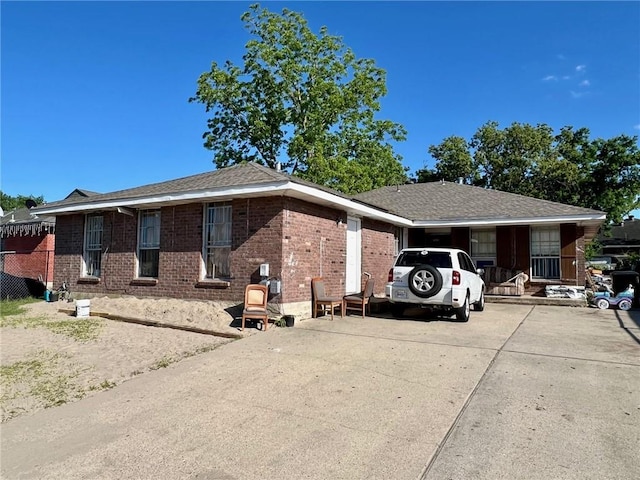 view of home's exterior featuring a carport