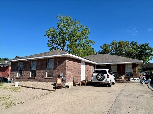 view of front of house featuring a carport