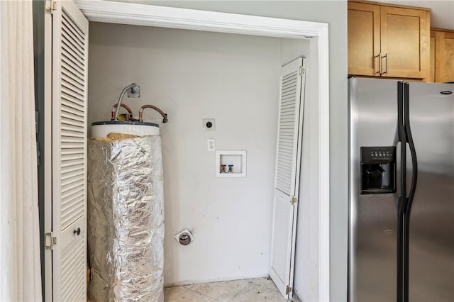 washroom with cabinets, hookup for an electric dryer, washer hookup, and light tile floors