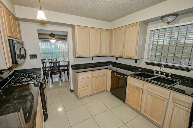 kitchen featuring sink, black appliances, light brown cabinets, light tile patterned floors, and hanging light fixtures