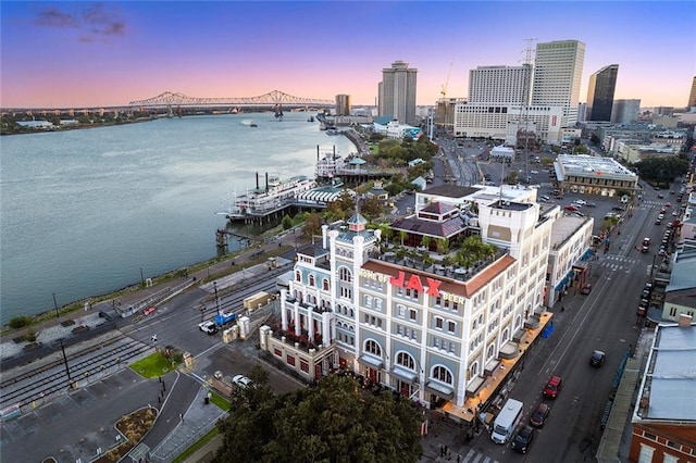 aerial view at dusk with a water view