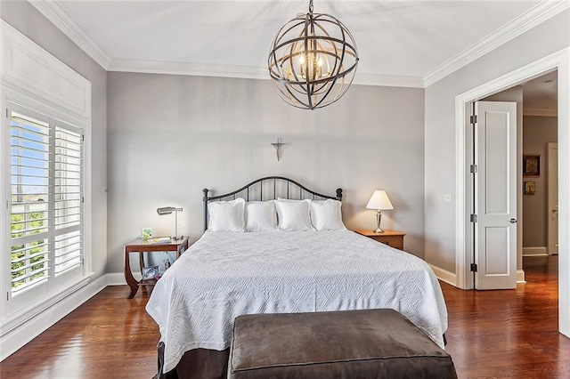 bedroom with a notable chandelier, crown molding, and dark hardwood / wood-style floors