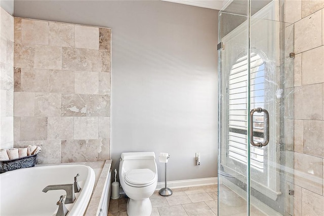 bathroom with tile flooring, shower with separate bathtub, and toilet