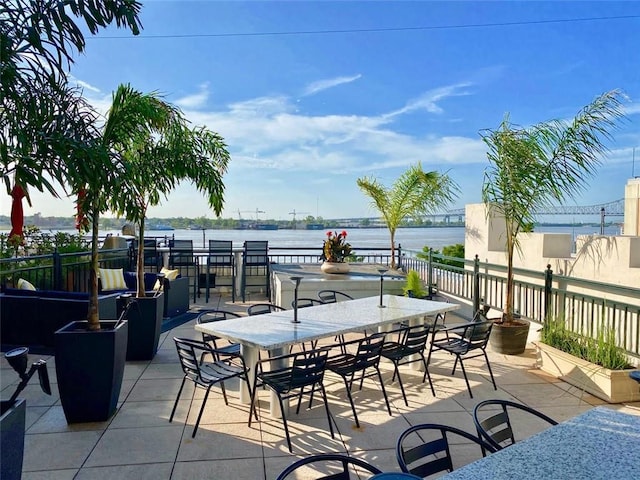 view of patio / terrace with a water view