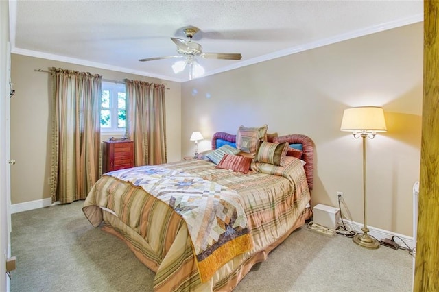 carpeted bedroom featuring ceiling fan and ornamental molding