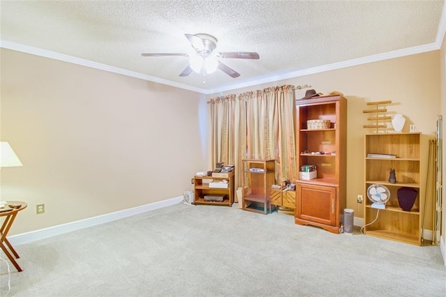 miscellaneous room with ornamental molding, a textured ceiling, ceiling fan, and carpet floors