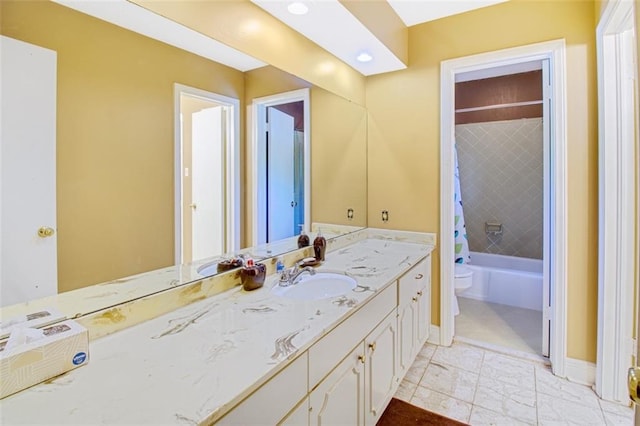 full bathroom with tiled shower / bath combo, oversized vanity, toilet, and tile flooring