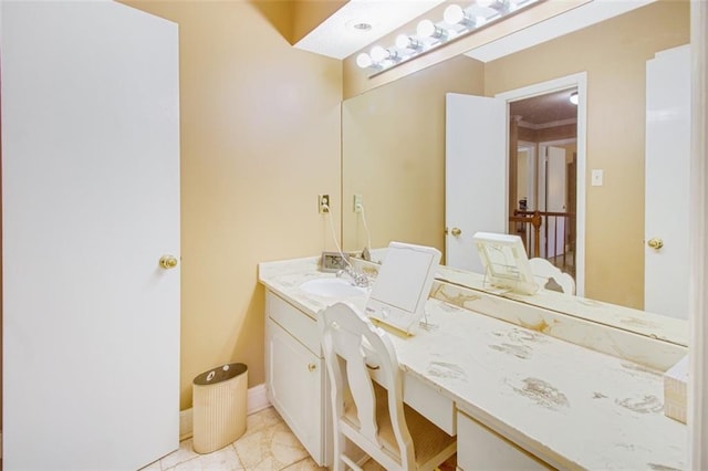 bathroom featuring tile flooring and vanity