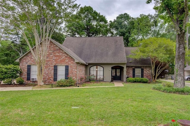 view of front of home with a front lawn