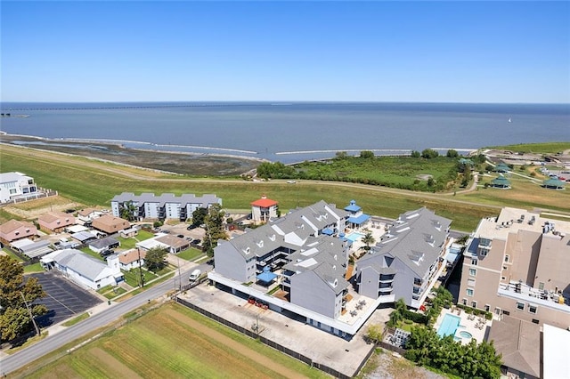 bird's eye view featuring a water view and a residential view