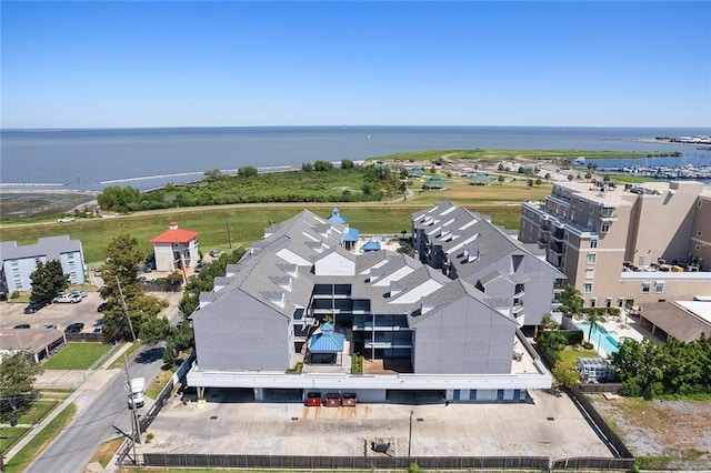 drone / aerial view with a water view