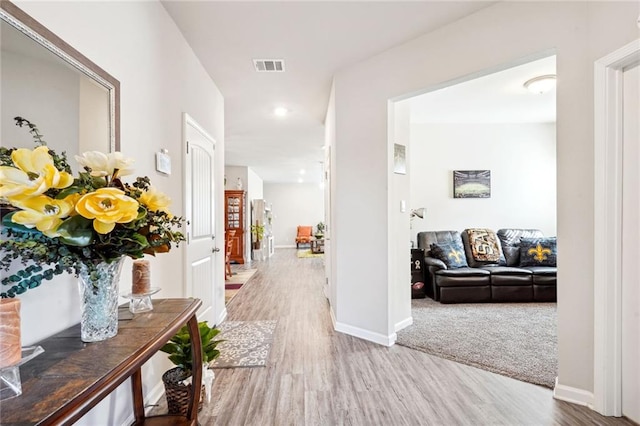 hall featuring hardwood / wood-style floors