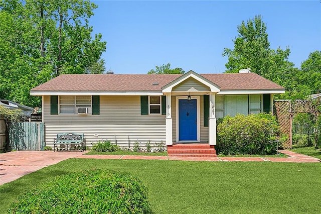 view of front of home with a front lawn