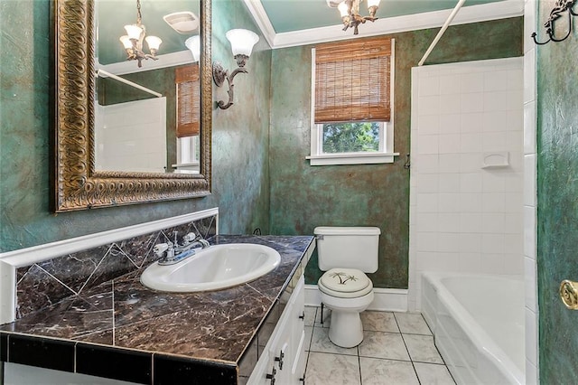 full bathroom featuring vanity with extensive cabinet space, a notable chandelier, shower / bath combination, toilet, and ornamental molding