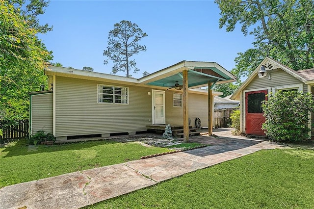 exterior space featuring a front lawn