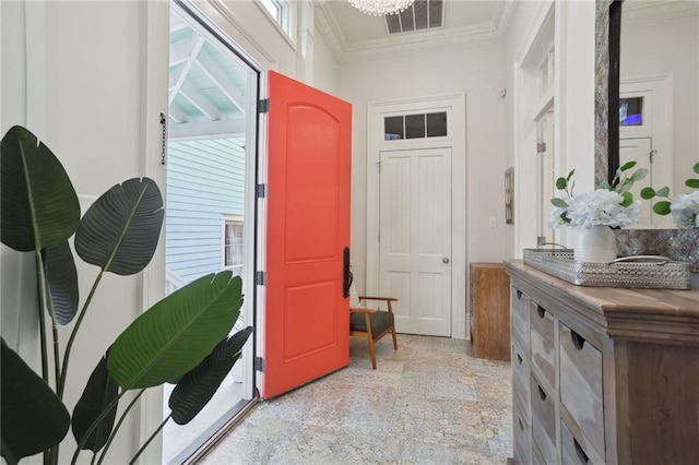 interior space featuring tile flooring and ornamental molding