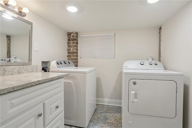 washroom featuring washer and clothes dryer, tile floors, and washer hookup