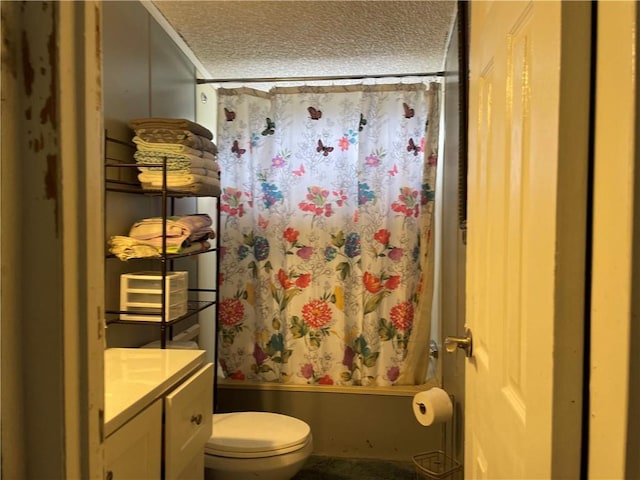 bathroom with toilet, shower / bath combination with curtain, a textured ceiling, and vanity