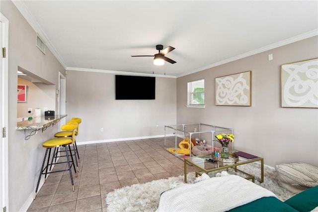 tiled living room with crown molding and ceiling fan