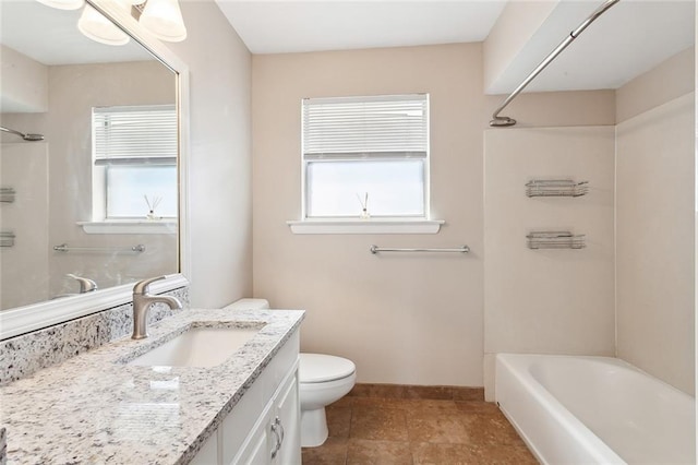 full bathroom featuring  shower combination, tile floors, oversized vanity, and toilet