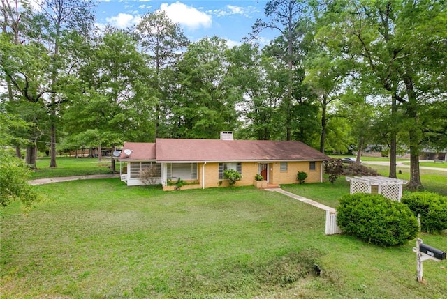 exterior space featuring a front lawn