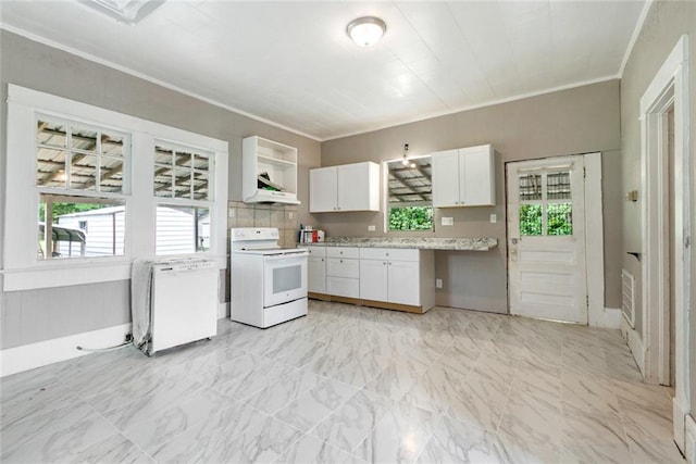 kitchen with plenty of natural light, white cabinets, white range with electric stovetop, and light tile floors