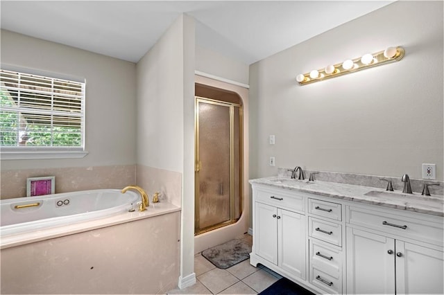 bathroom featuring vanity, tile patterned floors, and plus walk in shower