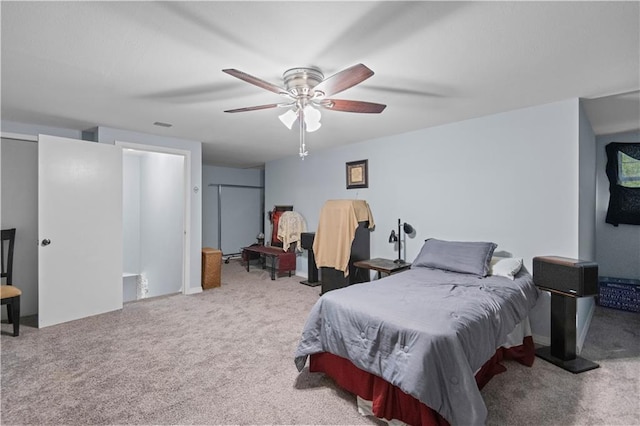 bedroom with ceiling fan and carpet flooring