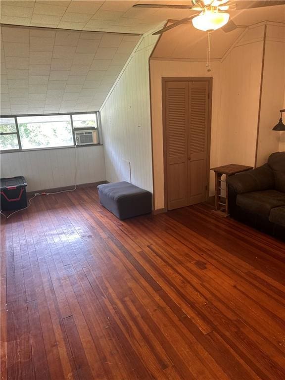 bonus room with dark wood-type flooring and cooling unit