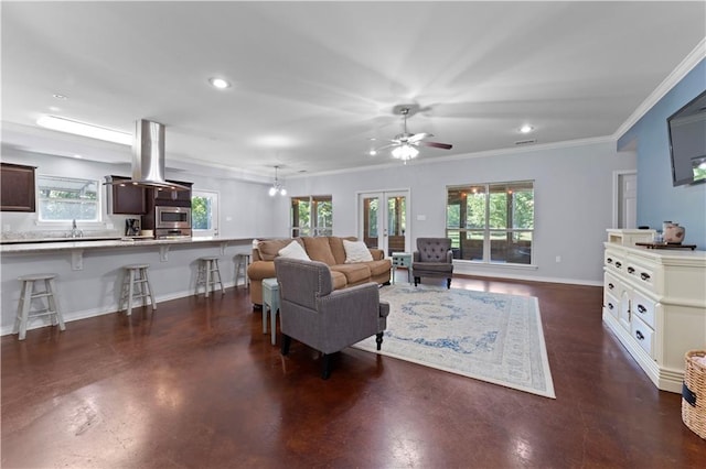 living room featuring french doors, ceiling fan, and crown molding