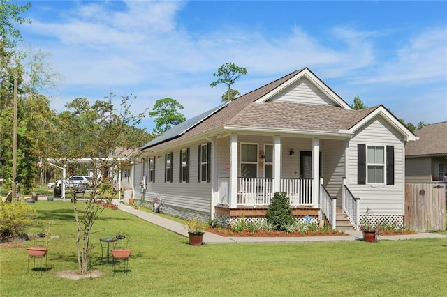 exterior space featuring a porch and a front yard