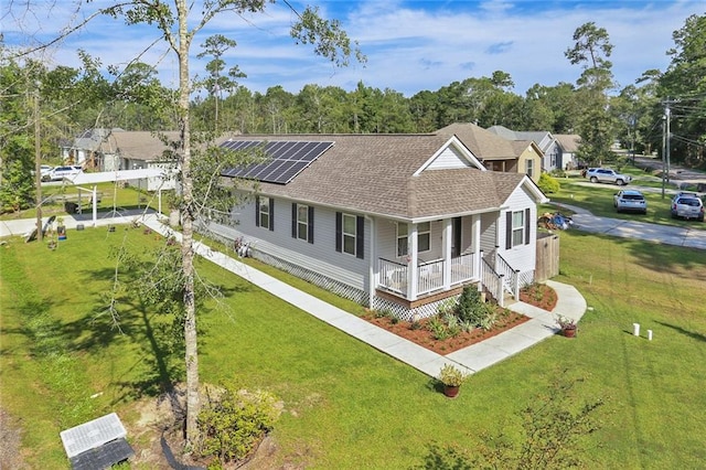 view of front facade featuring a front yard and a porch